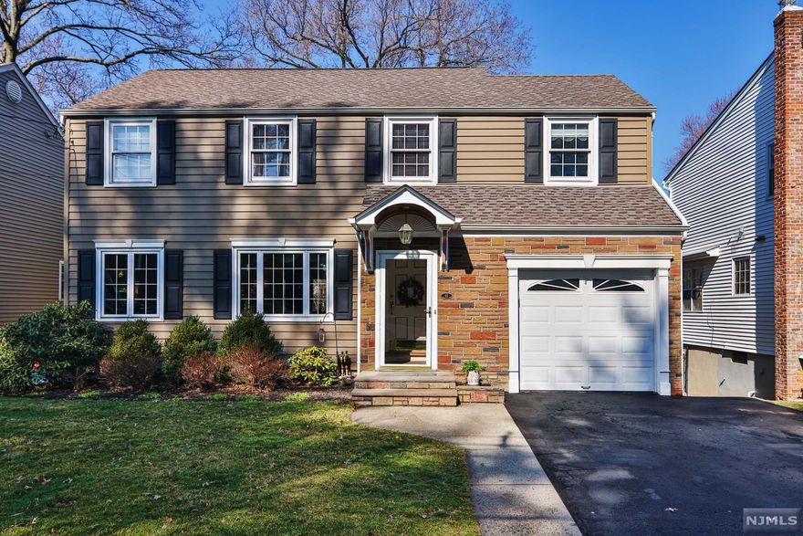 Welcome home to this beautiful move-in ready colonial located on a quiet tree lined street in the desirable Spring Garden Section. The first floor offers a large Formal DR, spacious LR, eat-in kitchen, office, laundry room and half bath. The second floor features a master en suite and 2 additional generous sized bedrooms with a full bath. The finished basement has a rec room and workshop. Entertain on the two tier deck which provides plenty of space for barbecues and outdoor dining. The fenced in yard with sprinkler system provides a maintenance free lawn. Extra amenities include an abundance of storage, cedar closets, 2015 hot water heater, 2010 roof/siding, 2000 HVAC, stereo system wiring inside and out and majority of the house has hardwood under carpeting. Close to highways, NYC, and shopping. Don't miss out on this incredible home!