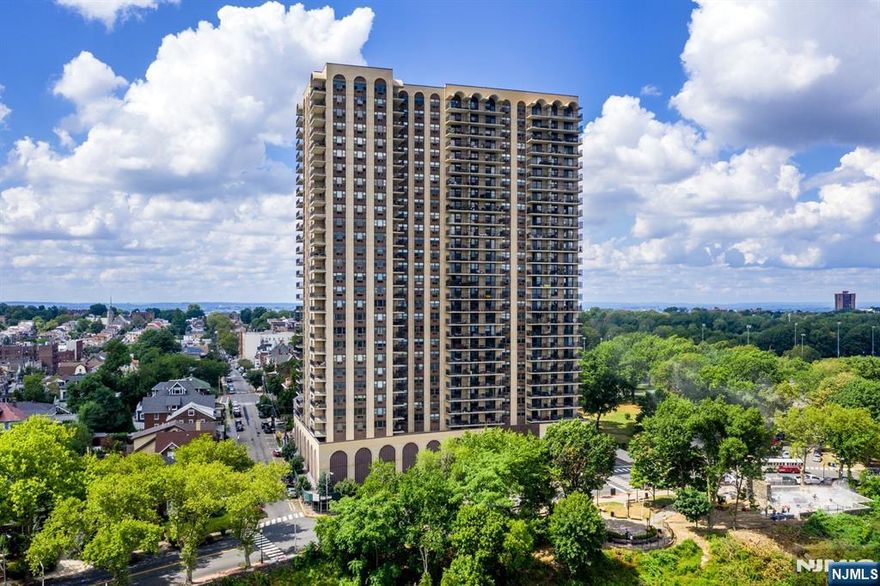 Spacious and beautifully remodeled 1,060 sq. ft. 1BR/1.5BA with private covered balcony and spectacular southeast-facing views of the NYC skyline and Hudson River. Enjoy iconic sights of the Empire State Building, Hudson Yards, and the Verrazzano-Narrows Bridge, plus stunning sunsets. Open-concept kitchen with stainless steel appliances, granite countertops, and peninsula flows into spacious living/dining area with balcony access. Oversized primary suite with walk-in closet and ensuite bath. Hardwood floors, crown moldings, abundant closets, and powder room. Available furnished or unfurnished. Full-service building with 24-hour doorman, garage attendant, on-site management, fitness center, outdoor pool (being replaced), and laundry on every floor. Rent includes one garage parking space, hot/cold water, sewer, pool, and gym. Tenant pays electricity, heat, A/C, internet, and cable. Enjoy free tennis and pickleball in the neighboring 167-acre park featuring a lake and extensive recreational facilities. Transportation to New York City is right at your doorstepâ€”just minutes to Manhattan by bus or ferry. Shopping and excellent dining options are nearby. A must-see home offering space, stunning views, and the convenience of full-service living. Call Jimmy Lopez 201-741-6298 for viewings.