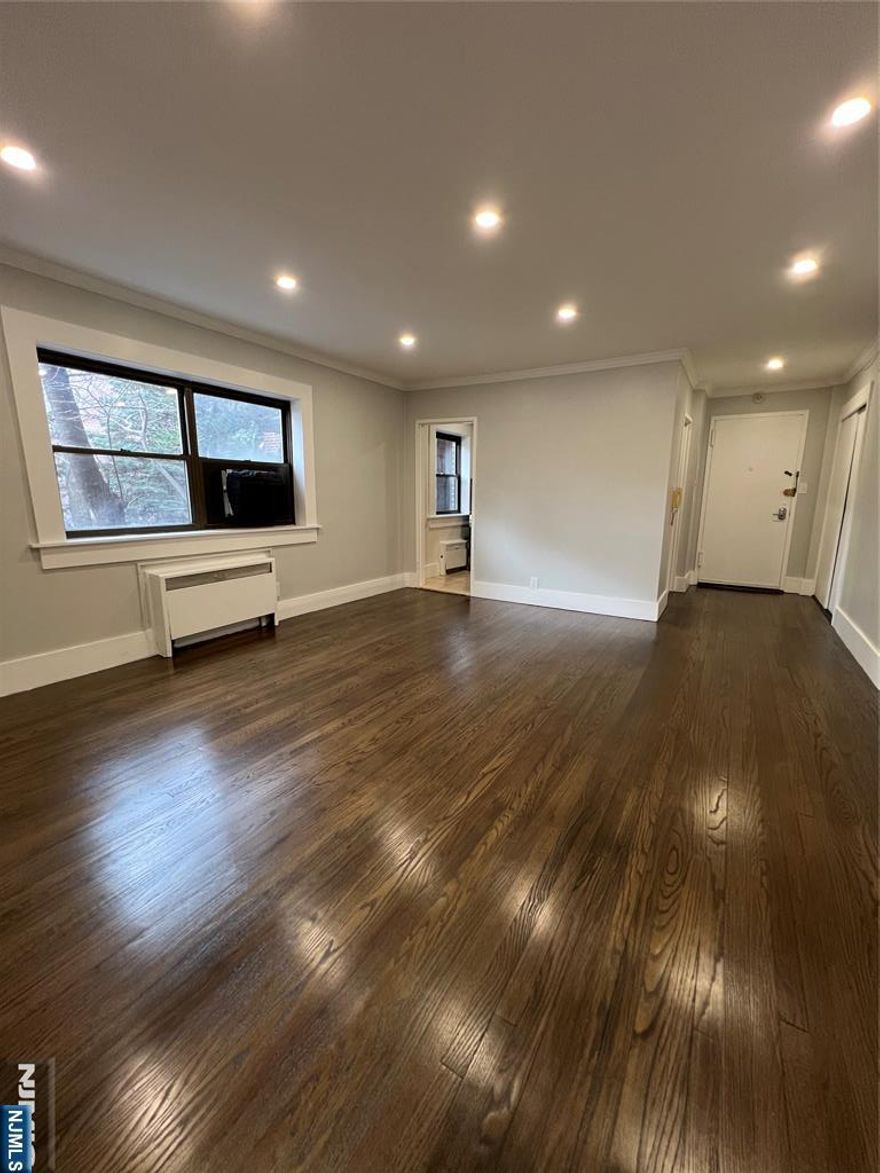 Be a part of the thriving community of Fort Lee from the truly unique, park-like grounds of Linwood Park Coop. The unit is walking distance to stores and shops (Including Starbucks, H-mart, 24hr CVS, etc.) and is footsteps away from public transportation to NYC. This must see unit features a spacious living area with plenty of natural sunlight. Dimmable recessed lighting throughout that allows you to set the mood to your liking. The kitchen includes newer stainless-steel appliances along with modern lighting and mahogany toned cabinets and premium granite countertops. The bathroom features elegant finishes along with a newer bathtub. New flooring with fresh paint. There is a generous amount of closet space to neatly fit your belongings. Co-op has lowest maintenance in Fort Lee and includes everything except electric and cooking gas. Sold "as is"