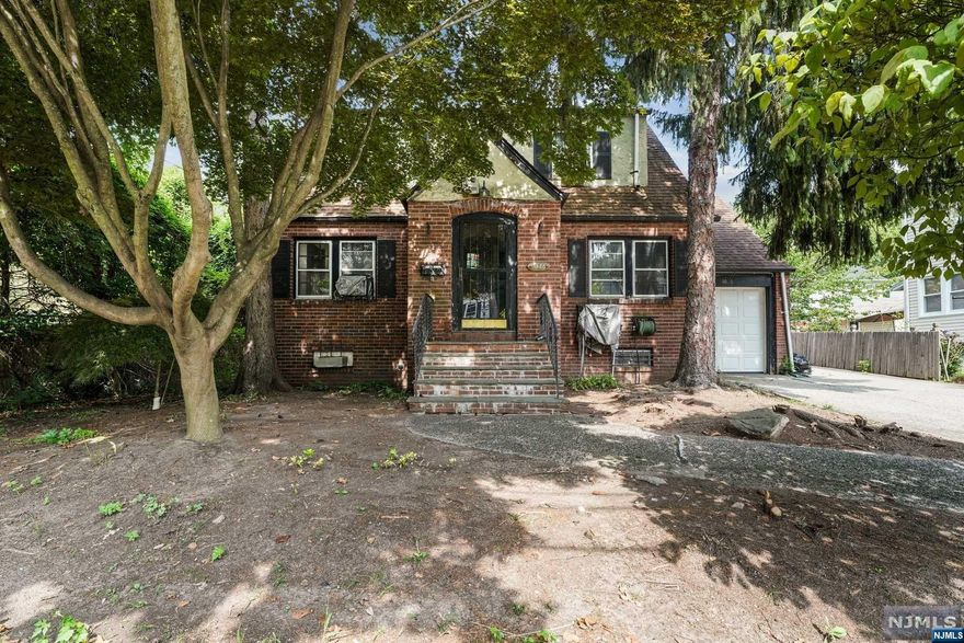 Charming colonial home on quiet dead end street with rare in-ground pool! Property possesses great bones so bring your contractor and imagination to create the perfect home tailored for you. Large primary bedroom, 2nd bedroom and full bath on second floor. Main level offers ground level bedroom, full bathroom, living room, dining room and kitchen. Spacious finished basement. Property is centrally located: close to major highways, public transportation, Whole Foods market, Garden State Mall, two blocks to elementary school, four blocks to Teaneck High School, houses of worship and parks. Great for owner occupant with vision or handyman looking for their next project. Sold completely 'as is' however priced to sell! Above ground tank present in basement and possible underground tank.