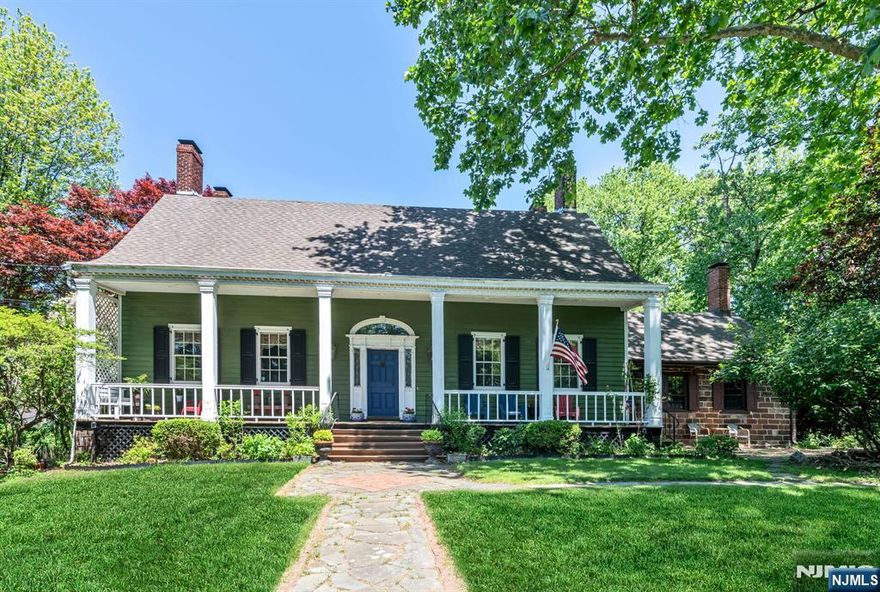 Stunning 4BR/3BA home on rare .55+ acre lot in desirable Leonia! Perfect for multi-generational living, this home features a separate in-law suite and private entrance. The magnificent great room features cathedral ceilings, a fireplace, a bar, and a loft, making it ideal for entertaining. The first-floor bedroom suite is perfect for individuals with accessibility needs. Chef's kitchen with granite counters, formal living & dining rooms, grand foyer. Multiple fireplaces throughout. Gorgeous front & rear porches. Fenced backyard, 4-car parking. Minutes to express NYC bus, excellent schools, quiet artsy community, just 15 minutes to Manhattan. Move-in ready with character details & modern updates. Freedom to customize the house to meet our needs. Rare find combining space, privacy, location & flexibility in one of Bergen County's most charming towns.