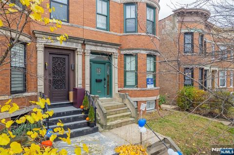 Photo of 257 Woodlawn Avenue, Jersey City, NJ 07305 (MLS # 25039733)