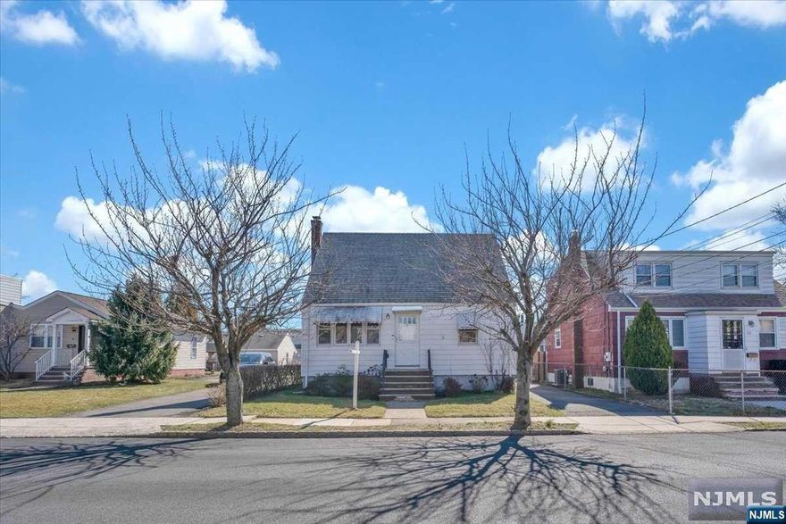 This lovely single family 4 bed 1.25 bath is located on a quiet block in the Silver Lake section of Belleville. On the first floor you will find the living room, kitchen, bathroom and 2 spacious bedrooms including the primary bedroom. The living room and bedrooms feature newly renovated hardwood floors. The kitchen also features newly renovated luxury vinyl floors and updated cabinets. On the 2nd floor you will find 2 spacious bedrooms with plenty of closet space and natural light. Enjoy warm quiet summer nights in the private fenced in back yard, also perfect for entertaining. The home also features a huge unfinished basement featuring a quarter bath with endless possibilities and also includes a washer/dryer. The driveway easily accommodates two cars for convenient off street parking. Home being sold AS IS.