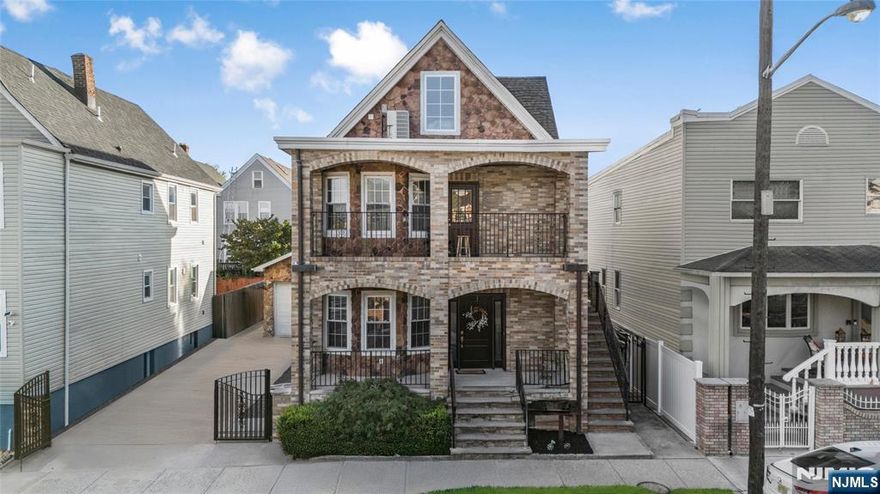 Welcome to 124 Devon Terrace, a beautifully maintained two-family home offering the perfect balance of space, privacy and modern design. The property features two separate residences: a 2-bedroom 2-bath Unit 1 and a 3-bedroom 2-bath Unit 2, ideal for owner-occupied living or a strong investment opportunity. Inside, both units feature bright open layouts with generous living and dining areas, contemporary kitchens and comfortable bedrooms. Each home includes a private terrace for relaxing or entertaining, while large windows fill the interiors with natural light. Unit 1 offers a welcoming main level with open living and dining spaces that flow into a spacious kitchen with outdoor access. The lower level includes a recreation room, full bath, and laundry, perfect for additional private space. Unit 2 features three bedrooms across two floors, including a top-floor suite with a full bath and open layout that can serve as a private retreat, lounge or studio. The main level includes a bright living room with terrace access and an airy kitchen and dining area. Outside, a large fenced yard provides space for gatherings, play or gardening. A long gated driveway and garage add convenience and privacy, completing this inviting property. Located on a quiet residential street near parks, schools and transportation, 124 Devon Terrace combines functionality and charm, offering a rare opportunity to own a spacious two-family home with exceptional indoor and outdoor appeal.