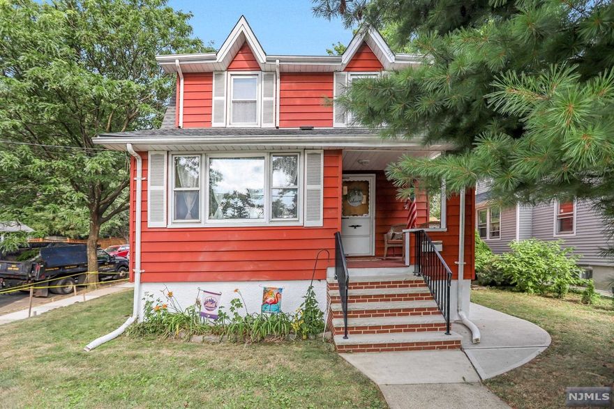 Updated items include newer sidewalks, newer driveway, newer roof, newer gas heating system, newer driveway, newer electric, newer dishwasher and stove, newer gutters. House has a warm and friendly front porch entrance way, and two real yard patios. Parking for two side by side cars in large new freshly paved driveway. First floor includes and warm sunroom that provides plenty of light, FDR, EIK, Dining Room. Lots of storage in basement and walk-up attic. Listing agent related to owner.