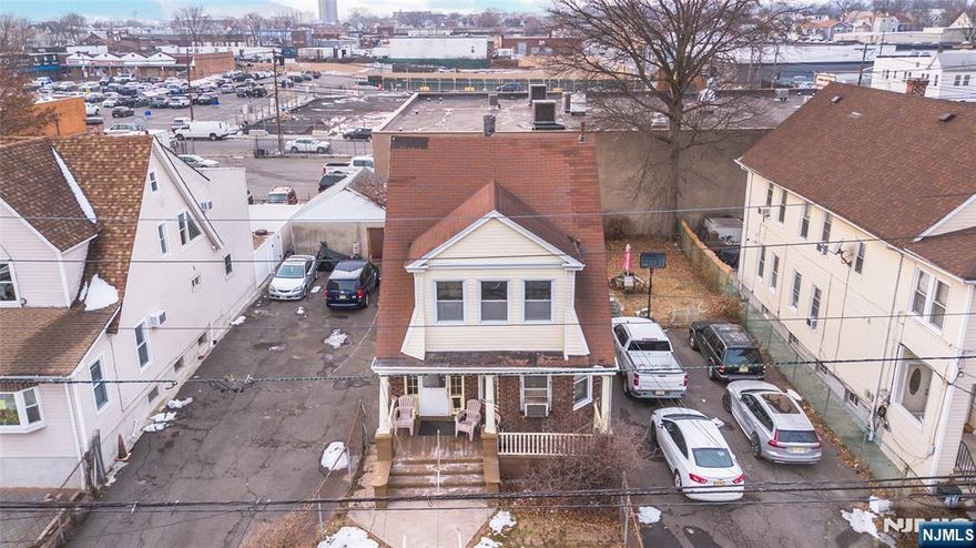 A Rare Opportunity for Expansion! This prime vacant lot, located at 452 E 31st Street, is being offered exclusively to the purchaser of the adjacent single-family Colonial home at 448 E 31st Street, Paterson. This lot cannot be purchased separately and must be acquired simultaneously with the house at 448 E 31st Street. Acquiring this adjacent parcel transforms your property into a large, double lot, providing unparalleled flexibility in the desirable Eastside neighborhood. Imagine the Possibilities: Massive yard:Significantly expand your private outdoor living space, for recreation, gardening or possibly a detached garage/studio/workshop (subject to municipal zoning and building approvals). Capitalize on this unique chance to control the entire footprint of this portion of the block, enhancing the value, privacy, and utility of your main residence. Buyer is responsible for all necessary due diligence regarding zoning, land use, and development approvals (e.g., permits for accessory structures, setbacks, etc.) from the City of Paterson Planning and Zoning Depart. Seller makes no representations or warranties regarding development opportunities. Buyer is solely responsible for all necessary due diligence regarding zoning, land use, and development approvals (e.g., permits for accessory structures, setbacks, etc.) from the City of Paterson Planning and Zoning Department. Being sold "AS IS"