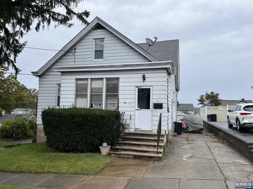 Fantastic investment opportunity for a two-family home in need of renovation! The first floor features three bedrooms, an eat-in kitchen, and a full bath, while the second floor offers one bedroom, two dens, an eat-in kitchen, and another full bath. Situated on a spacious, oversized, flat lot in a prime location, this property is conveniently close to local NYC transportation and shopping. Don't miss out on this excellent chance to transform and make this property your own!