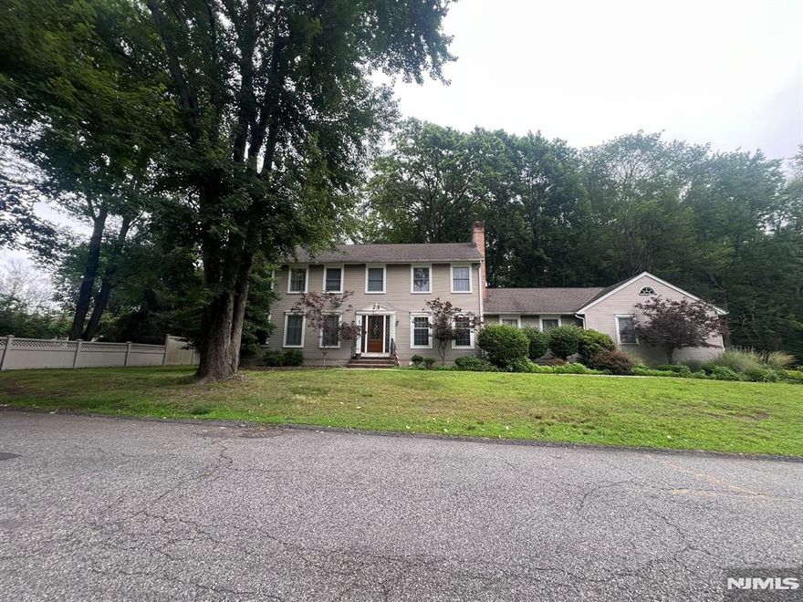 Nestled on a generous .522-acre lot at the end of a quiet cul-de-sac, 410 Mark Place offers rare privacy and a picturesque setting with a natural wooded backdrop and direct access to the town athletic field. This well-kept colonial home has been lovingly maintained by a long-time tenant and features a finished basement with ceramic tile flooring, a full bath, and versatile space ideal for a home office, guest suite, or recreation area. The extra-wide expanded driveway leads to an attached 2-car garage, providing ample parking and convenience. Located in one of Bergen Countyâ€™s most desirable towns, River Vale is known for its top-rated schools, scenic parks, and vibrant community life. Upscale buyers will appreciate the blend of peaceful suburban charm with easy access to golf courses, local shopping, and major commuting routesâ€”making this property an exceptional opportunity to create a dream home in a sought-after neighborhood. Offer to include these specific terms in the additional agreements section. No showings or walking on the property until inspection. Move in condition offered at below market price for a "buyer willing to personally occupy" and make this their home, no investors.