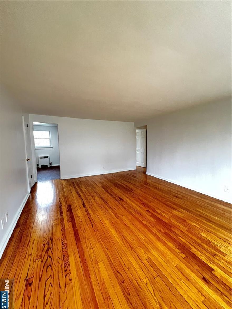 Newly updated 2 bedroom apartment conveniently located in Palisades Park. This unit has hardwood floors, a spacious living room, and spacious kitchen and bathroom. There is ample closet space throughout the unit. Parking is first come first serve in the lot and there is coin laundry in the building. The tenant pays electricity and landlord pays heat, water, and cooking gas. No pets.