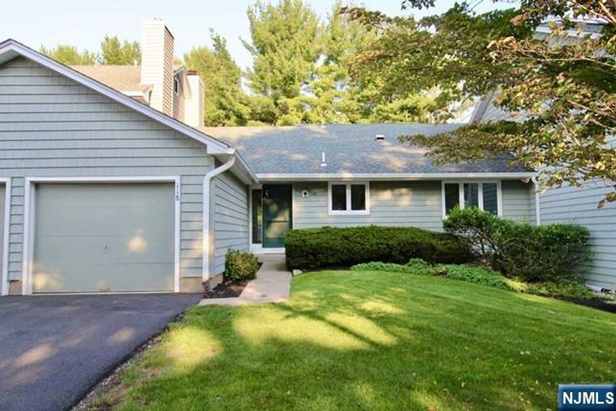 Welcome to lovely Ramapo Ridge. Sun-filled Living room which leads to a private deck. Newer hardwood floors throughout. Updated Kitchen, in-unit laundry, full hall bath, master bedroom with double closets and ensuite full bath. Second bedroom also with double closets. Attached Garage and park space. Ramapo Ridge includes an on-site fitness center, tennis/basketball courts and outdoor pool. No pets.