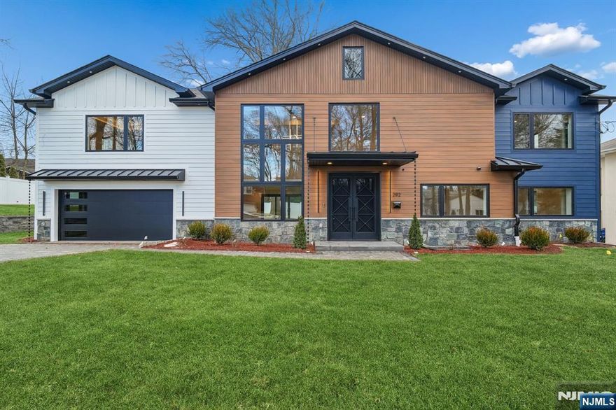 Beautifully constructed new home on an existing foundation, featuring 5 bedrooms, and 5.5 bathrooms with an open, thoughtfully designed layout. The first floor welcomes you with a stunning two-story grand foyer, a spacious great room that flows seamlessly into a gourmet kitchen with a quartz island, formal dining room, living room, powder room, den, mudroom with built-in shoe cabinets, additional storage, and direct access to a heated two-car garage. The second floor offers five bedrooms, four full bathrooms, and a convenient laundry room. The lower level features a recreational room with an additional full bathroom, providing flexible space for entertaining, fitness, or relaxation. In addition to the attached heated two-car garage, the property includes a newly built detached garage with electric wiring ready for air-conditioning installation and a driveway accommodating 3â€“4 cars. The home is equipped with durable Hardie siding, a striking double metal door with insulated tempered glass, and wiring in place for an internet booster. Park/Play ground located a block away,