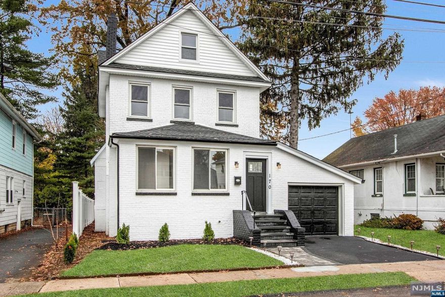 Gorgeous, completely Renovated Colonial Home with a Luxurious Open Floor Plan! Welcoming home with bright foyer/mudroom, including modern half bath. Spacious living room features impressive 9ft ceilings and custom fireplace, open to open dining area. The kitchen is a true highlight, showcasing stunning Quartz countertops, peninsula/breakfast bar, white cabinets and stainless appliances. Upstairs, you'll find three generously-sized bedrooms and a modern full bath. Lower level is fully finished and offers a walk-out design, with a large recreation room and storage space. Professionally landscaped property offers a fenced-in yard and inviting patio perfect for entertaining. Attached garage provides added convenience to this exceptional home. Recent renovations include a modern kitchen with Quartz countertops, updated bathrooms with contemporary fixtures, a finished lower level, and the beautifully landscaped property with a fenced-in yard and patio.