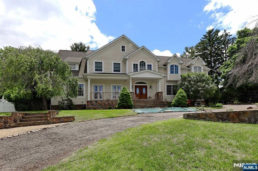 Stunning 6,500 sq. ft. 6-bedroom, 7.5-bathroom home located in a very desirable Wyckoff neighborhood. Large, bright rooms with high ceilings throughout. Walk through the front door to a picturesque entry foyer that flows into the rest of the first floor, including a huge high-end chef's kitchen featuring a large island, granite countertops, and stainless steel appliances. The first floor also includes a great room with a marble fireplace, dining room, mudroom, office/den, and a full bath. The second floor features a bright and airy primary suite with a walk-in closet, fireplace, ensuite bathroom, and dressing room, along with 4 additional bedrooms and 2 more full baths. A large 1-bedroom guest suite is situated over the garage with its own private entrance. In addition, the full basement offers a theater, office, rec room, and storage. The park-like backyard includes a beautiful inground pool. Sold as-is, third-party approval required. Buyer responsible for obtaining towns COs.