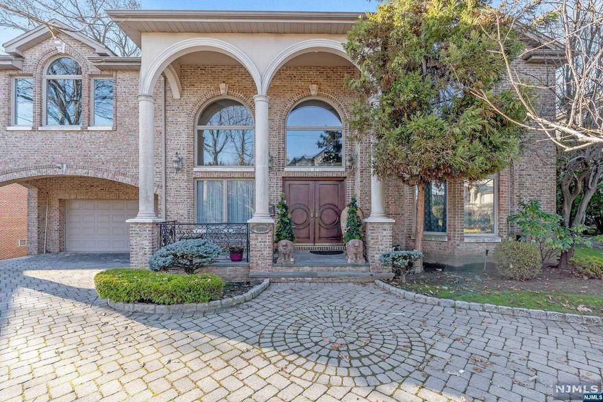 Step into luxury living with this magnificent side hall colonial nestled in the highly desirable Bluff Section of Fort Lee. Boasting 3 very generously sized bedrooms and a very large Primary en suite bedroom. The outdoor space is an entertainer's paradise, with meticulously maintained yard and a patio ideal for al fresco dining. Full finished basement with wine cellar, Office and extra bonus room with full bath. Conveniently located in Fort Lee's prestigious Bluff section, this home offers easy access to schools, parks and the vibrant local community. Don't miss the opportunity to make this exceptional property your own-a perfect blend of sophistication and comfort in one of the most coveted neighborhoods.