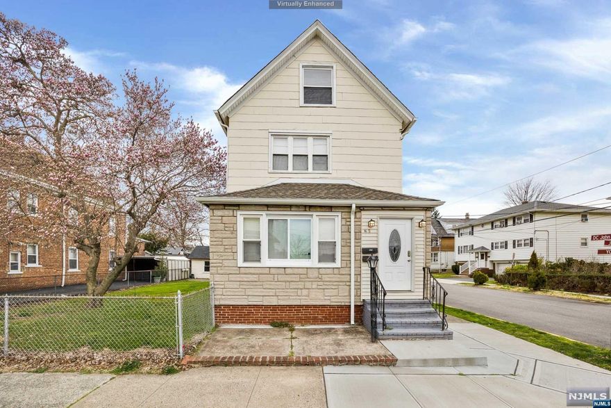 Just reduced. 2 family home on 50x100 lot with detached 2 car garage and driveway. Corner property features updated kitchens and baths. Spacious layout, separate entrances, finished attic and full basement. Don't miss this great investment opportunity.