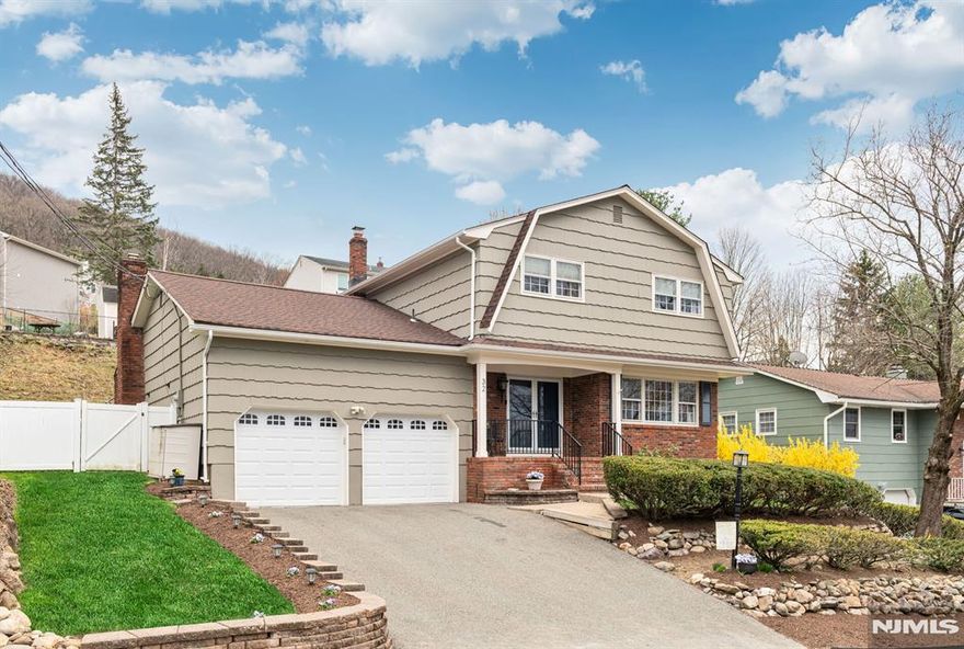 Gorgeous Colonial home in prime cul-de-sac location, sits majestically on its lot, offering timeless curb appeal & exceptional living space. Relax w/a good book or simply take in the view from the charming front porch an inviting extension of this beautiful home. Step inside to a spacious, welcoming foyer w/powder room & entry closet. The oversized LR features a decorative faux fireplace. A generously sized Formal dining room is perfect for hosting gatherings of any size. The eat-in kitchen is ready for your culinary creativity, w/ample space to try all those recipes you've been saving. A convenient laundry room w/direct access to the backyard adds everyday practicality. The family room expands the first-floor living area, highlighted by a cozy WB fireplace & sliding glass doors leading to the outdoor oasis. Upstairs, you'll find 4 oversized bedrooms, thoughtfully spaced for comfort & privacy. Two beautifully updated full baths enhance the level, including a private en-suite in the primary bedroom. Rich wood flooring flows throughout both levels, adding warmth & continuity. The finished basement offers even more living space, along w/a dedicated storage area. Step outside & experience your own private retreat & incredible in-ground pool & backyard setting that feels like a vacation at home. Ideally located for commuters w/easy access to NYC via nearby express park-and-ride, & just moments from shopping, dining, hiking, & boating this home truly has it all.