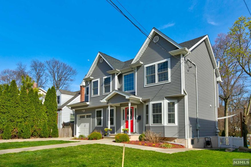 Welcome Home to this Beautiful Custom Colonial on a Cul-De-Sac Street. Newly built in 2016, this modern house features 4 bedrooms and 3.5 bathrooms, has lots of Charm and Character. Enjoy the spacious open flow concept. The foyer greets a charming living room with recessed lighting and detailed crown moulding. Entertain in this spectacular gourmet custom kitchen with white cabinetry, under cabinet lighting, stone counter tops, subway style backsplash, stainless appliances and large center island. completing the first floor is the open formal dining area, half bath and mudroom with direct access into the garage. Center stairway leads you to the second floor which features 4 bedrooms and 2 full bathrooms . Enjoy function and flow in the master suite with a spacious walk- in closet, en-suite with double vanity and glass stall shower. Enjoy and relax in the large backyard. An amazing home for entertaining guests. Near all major highways and minutes from NYC. Come before it's gone!