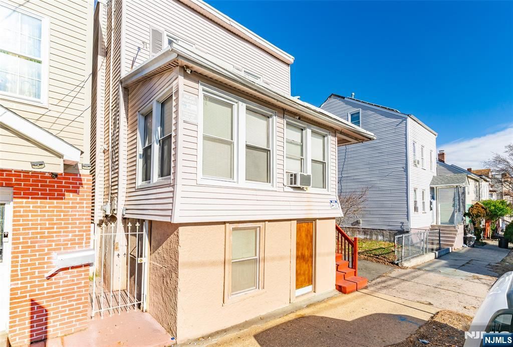 Photo of 197199 16th Avenue, Paterson, NJ 07501 (MLS # 26001420)