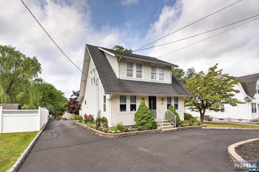 Charming 3-bedroom, 2-bath Colonial on a spacious lot over 1/2 acre! Create your own backyard paradise. This home features a large, updated eat-in kitchen with an island, modernized bathrooms, and a finished basement. Enjoy the beautiful Trex deck accessed by a sliding door, as well as a paver patio. The circular driveway offers easy access. Move-in ready.