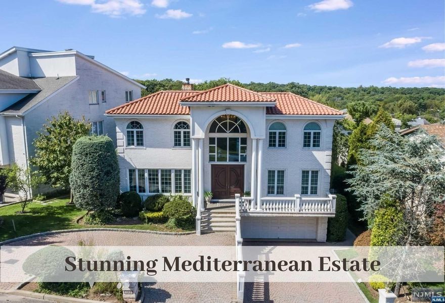 Stunning Architectural Features appoint this meticulously maintained Mediterranean Estate delivering Outstanding Elegance, Beautiful Floor Plan, Generous Proportions & Superior Quality. 2 Story Entrance Foyer w Chrystal Chandelier, Granite Floors & Sweeping Staircase sets the tone for whats to come. Living & Dining Rm offers setting for formal entertaining but seamlessly flows to Kitch w Top-of-Line Appliances & Family Rm w Wall of Windows & Fireplace for inviting retreat. Home Office or Future 1st Fl Bedrm, Powder Rm & Lndry complete 1st fl. Impressive 2nd Fl Landing translates the attention to detail throughout. Striking Prim Suite w 2 WIC's & EnSuite Bath is your future Oasis. 3 More Bedrms & 2 Baths complete 2nd Fl. Lower Level offers Entertainment Rm w Sliders to Private Rear Pool Area & Al Fresco Dining. Nearby is 5th Bedrm & Full Bath. Glistening Granite Floors. Mahogany Trim, Doors & Floors. Radiant Heat. Approx 5,200 SF of Living Space. Special Features List upon request.