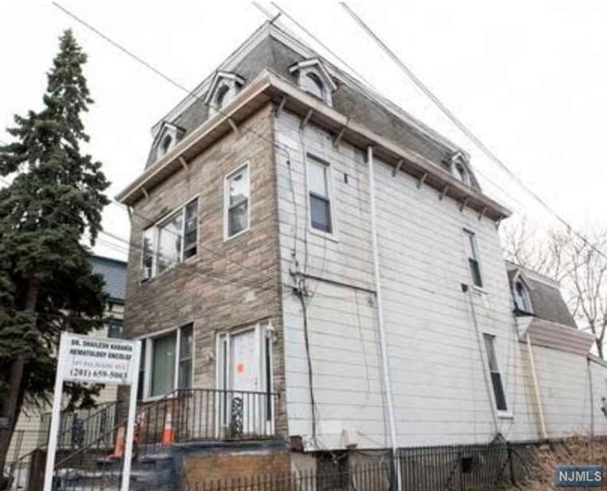 Great Rehab or Development opportunity for developers in the booming Jersey City Heights. This is an oversized double lot 52x120 with tons of potential. Build condos or 2 family homes in the perfect location with NYC views and NYC bus stop across the street. Easy access to major highways. Home being "sold as is". Agent related to owner