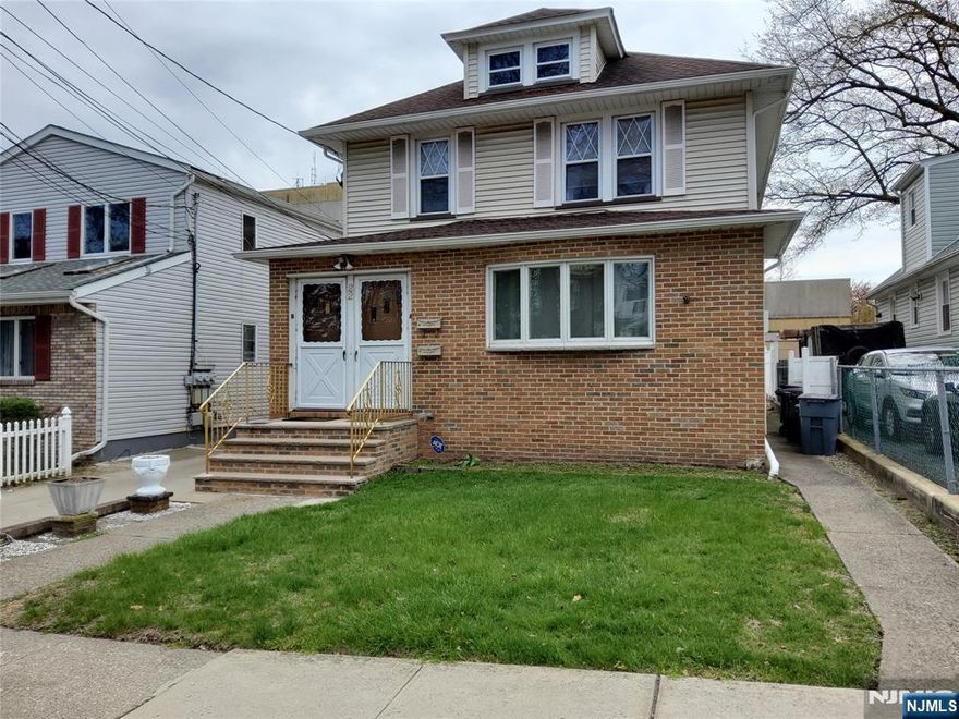 Updated, first-floor, bright, two-bedroom unit available for immediate occupancy. Amenities include a modern eat-in kitchen, oven/range and hood, dishwasher, refrigerator, hardwood floors, and two-car night-time parking in driveway. Offers a spacious living room, dining room and a den/office space along with two bedrooms and a full bath for your comfort. Laundry, washer/dryer hook-ups. No pets and no smoking please. *Listing agent related to landlord.