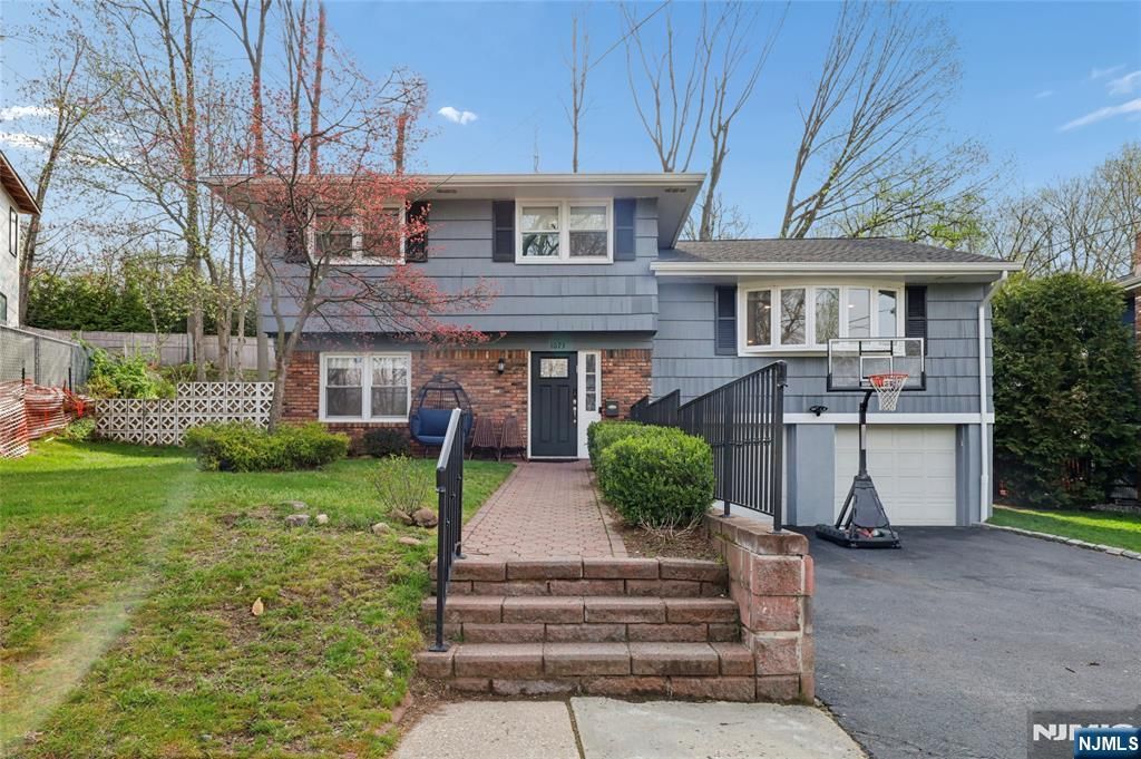 Photo of 1073 Allessandrini Avenue, New Milford, NJ 07646 (MLS # 26013021)