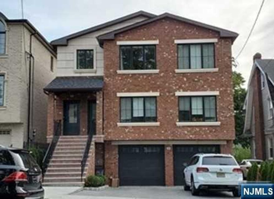 LIKE NEW 2FAMILY HOUSE ON THE 1ST FLOOR. MODERN AND EXQUISITE DESIGN. OPEN LAYOUT WITH FINEST MATERIALS AND APPLIANCES. CENTRAL HEATING AND A/C, LARGE DECK, FIRE PLACE, WASHER/DRYER IN UNIT, ONE CAR GARAGE AND DRIVEWAY PARKING, USE OF BACKYARD. CONVENIENTLY CLOSE TO NY EXPRESS BUS, SCHOOL, MAJOR HIGHWAYS, SHOPPING. LANDLORD MAY CONSIDER A SMALL DOG.