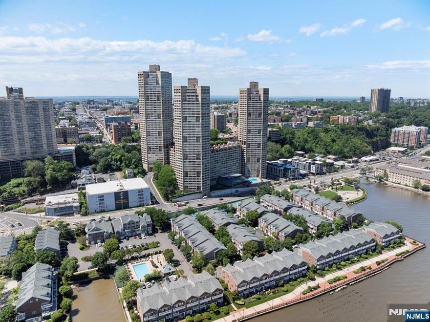 Welcome to this 1,546 sq. ft. residence, offering unparalleled views of New York City. This spacious unit features 2Br 2BA, each room boasting a breathtaking southeast view that spans from the iconic Empire State Building to beyond Lower Manhattan. The oversized living room and bedrooms provide ample space for relaxation and comfort. The formal dining room is perfect for hosting gatherings. The renovated kitchen is equipped with modern amenities, ensuring a seamless culinary experience. Experience the vibrant lifestyle and convenience of Galaxy towers, with easy access to local amenities and transportation. Located in the Galaxy Towers, enjoy resort-style amenities including a 24-hour concierge, indoor heated pool, outdoor pool, gym, weights room, childrenâ€™s playroom, residentsâ€™ lounge, and indoor parking. The attached mall features a pharmacy, grocery store, restaurants, daycare, and moreâ€”everything you need just steps away!