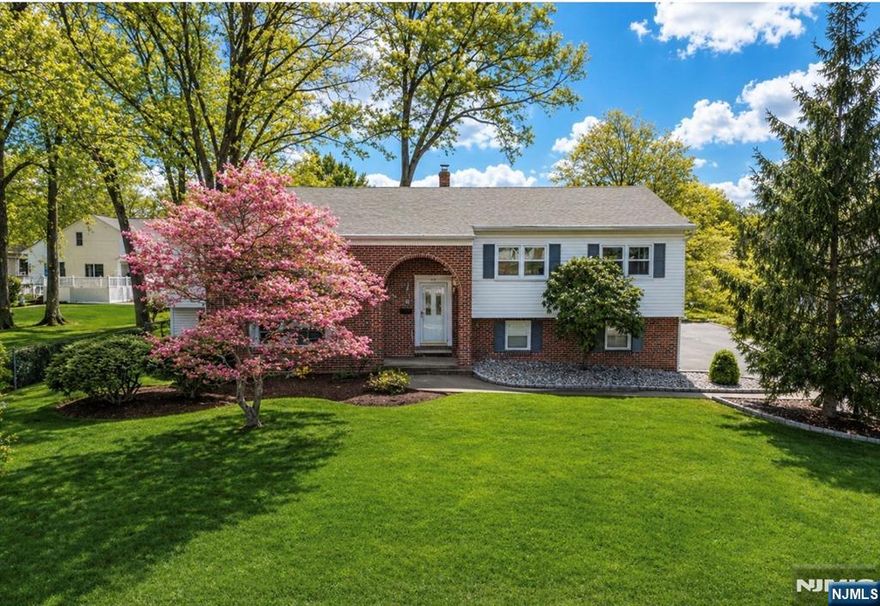 PARAMUS CONTINUES TO BE ONE OF NORTH JERSEY AND BERGEN COUNTYâ€™S MOST SOUGHT-AFTER LOCATIONS. OUTSIDE YOUâ€™LL ENJOY THE PEACEFUL QUIET OF A CUL-DE-SAC LIFESTYLE COMPLETE WITH A GENEROUS LEVEL YARD PERFECT FOR ENTERTAINING AND PLAY. THIS THOUGHTFULLY MAINTAINED, MOVE-IN READY BI-LEVEL HOME ADDS FUNCTION AND CHARACTER. KITCHEN WITH CORIAN COUNTERTOPS, HARDWOOD FLOORS THROUGHOUT, 5 BEDROOMS, 3 FULL BATHS AND A SEPARATE LOWER-LEVEL MULTI-GENERATIONAL STYLE LIVING SPACE OR HOME OFFICE. COMPLETE WITH A WOOD-BURNING FIREPLACE, KITCHENETTE, BEDROOM, FULL BATH, SEPARATE JACUZZI ROOM WITH FRENCH DOORS TO A 3 SEASON PORCH AND ADDITIONAL LARGE STORAGE ROOM. OVERSIZED 2 CAR ATTACHED GARAGE WITH MULTIPLE ADDITIONAL PARKING SPOTS IN WIDE DRIVEWAY. UPDATED WINDOWS, NEWER ROOF, RECENTLY UPDATED CENTRAL AIR, WHOLE HOUSE GENERATOR AND SPRINKLER SYSTEM. NO KNOWN ISSUES BUT IS BEING SOLD â€˜AS ISâ€™ CONDITION. DRAINAGE EASEMENT ON EACH SIDE OF PROPERTY. CLOSE TO VAN SAUN PARK WITH ITâ€™S OWN TRAIN RIDE, ZOO, TENNIS COURTS, WALKING TRAIL, CAROUSEL, ENORMOUS PLAYGROUND AND EVEN ICE SKATING IN THE WINTER. CONVENIENT LOCATION WITH THREE NEARBY SHOPPING MALLS, AMAZING TOP RATED SCHOOLS, MULTIPLE HOUSES OF WORSHIP, BANKING, THE NEW VALLEY HOSPITAL, MAJOR HIGHWAYS INCLUDING ROUTES 17,4 AND GSP MAKING COMMUTING TO NYC A BREEZE. ALL THIS AND LOW TAXES!