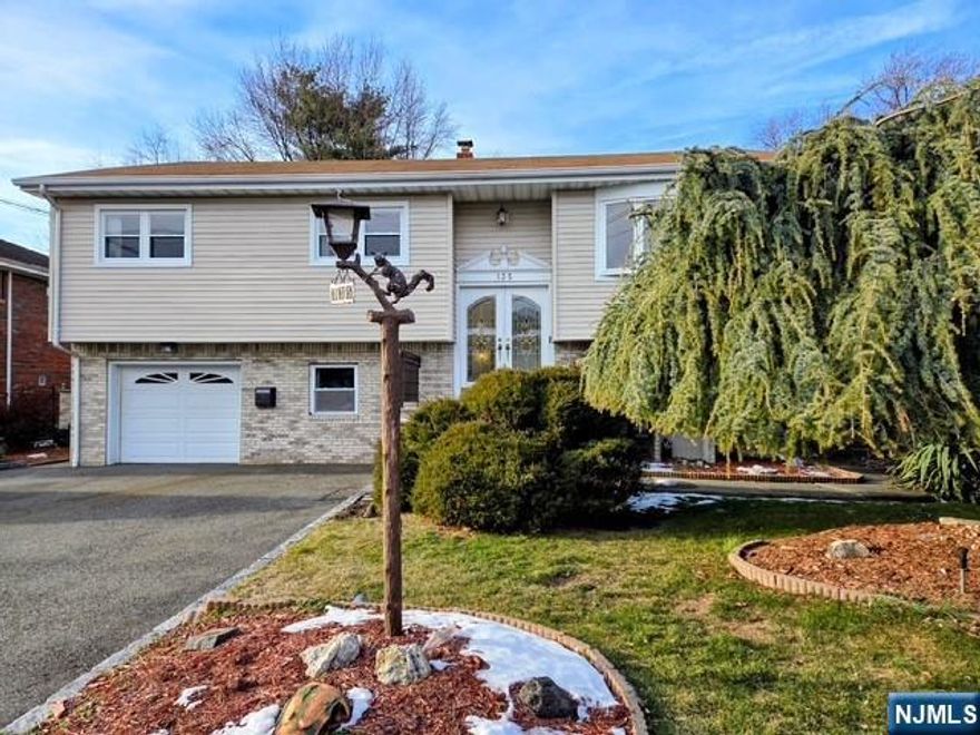 Welcome to this uniquely spacious bi-level home, Fully renovated!! move-in ready. Exceptional Bi-Level with Dual-Living Potential in Heart of Little Ferry! Designed with an expansive layout, this property is perfect for multi-generational living or those seeking an oversized home office. The interior features 3 bedrooms and 3 full bathrooms, along with a rare configuration of two full kitchens and extra range area, two sun-drenched living rooms, and two formal dining areas..Bright and spacious ground level with full windows and easy access to the garage and backyard. Enjoy the convenience of a dedicated laundry area and a private office space.3 heating zone. Outside, the large backyard is an entertainer's dream, featuring a patio and storage shed. With a 1-car garage plus 2-4 additional driveway spaces. walking distance to the bus station to NY, close to all major highways, with easy access to shopping centers, restaurants, and more.Not in flood zone.