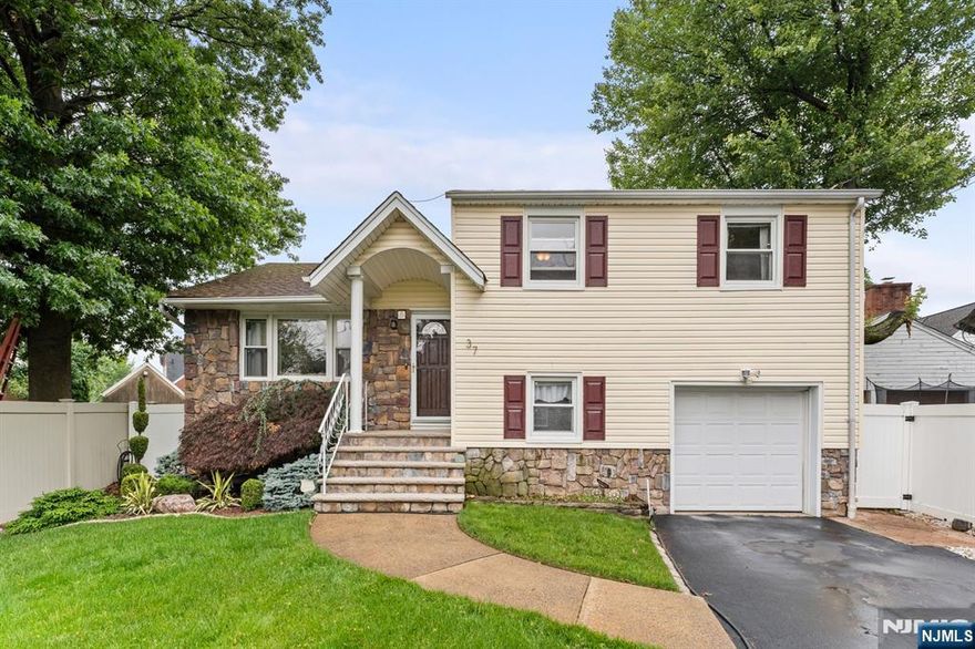 Welcome to this charming gem located in the desirable Sunnyside section of Linden City. Perfect for first-time home buyers, or anyone looking to enjoy the best of suburban living with city access just minutes away. Filled with natural light, this home features gorgeous hardwood floors throughout the entire home. Main bath has been thoroughly updated and well-maintained. 3 bedrooms each with great closet space. Functional kitchen making it easy to maintain. Separate rear entrance to a potential in-law sweet or bonus space perfect for a guest retreat, family room for game or movie night, or home office! Partial basement with tons of storage space. Spacious 1 car garage with parking for 2 additional vehicles in driveway. A privately fenced backyard filled with beautiful trees and paver patio leads to a secluded hot tub, creating an oasis ideal for summer barbecues, morning coffee, or relaxing after a long day! This property is located around the corner from bus routes to NYC, 2 miles away from the train station, and 1/2 mile from the Garden State Parkway! In addition, shopping, fine dining, and houses of worship are all a walkable distance away. Quiet community living with all the excitement of the city within reach. Great taxes, schools, and parks. Whether you're starting a new chapter or investing in your future, this Linden home is a rare find with endless potential. Home is being sold AS IS. PRICED TO SELL!!!