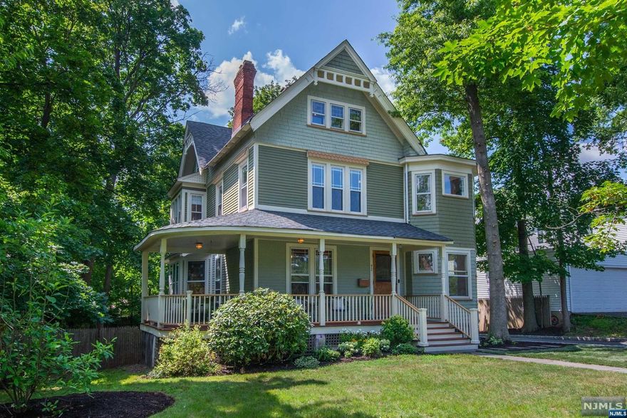 This almost 3,000 sq ft 'turn of the century' beauty has been extensively renovated, & retrofitted w/modern systems & mechanicals, like a/c & forced hot air, a tankless HWH, & updated kitchen & baths. It is a stunning example of the historic character for which Montclair is known & loved, with echoes of Victorian grandeur, & evidence of irreplaceable craftsmanship in many original details such as pocket doors, leaded pane & stained glass windows, & tiled fireplace surrounds. This home has got the updates, the scale & the beauty, high ceilings, lge rooms, & a coveted 1st fl powder rm. Not only does it offer multiple remote work options, but the huge basement is a blank canvas for your future home gym, rec room, or media room dreams. The large eat in kitchen opens to a beautiful deck overlooking the deep backyard, patio & firepit, & the stunning wraparound front porch is the icing on the cake. Move in to this turnkey home so you can make the most of summer in Montclair.