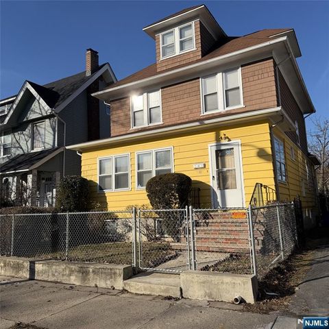 Photo of 63 Sunnyside Terrace, East Orange, NJ 07018 (MLS # 26013191)