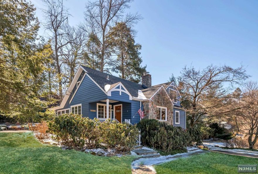 Pines Lake! Sought after location close to the main beach. This updated home is full of charm. The entry foyer opens to the dining room and living room with a fireplace. The open floor plan flows into the expanded and updated kitchen with a vaulted ceiling. The kitchen features a center island, stainless appliances, lots of cabinets plus a dining area. Doors open to the rear patio and yard. There are 2 bedrooms and a full bath on the main floor. The second floor features the lovely, primary bedroom suite with a large walk in closet and beautiful bath. Hardwood floors, first floor laundry. Located steps away from the the main beach and lake and the many activities that Pines Lake has to offer, including, tennis, sailing and swimming and more. A must see!