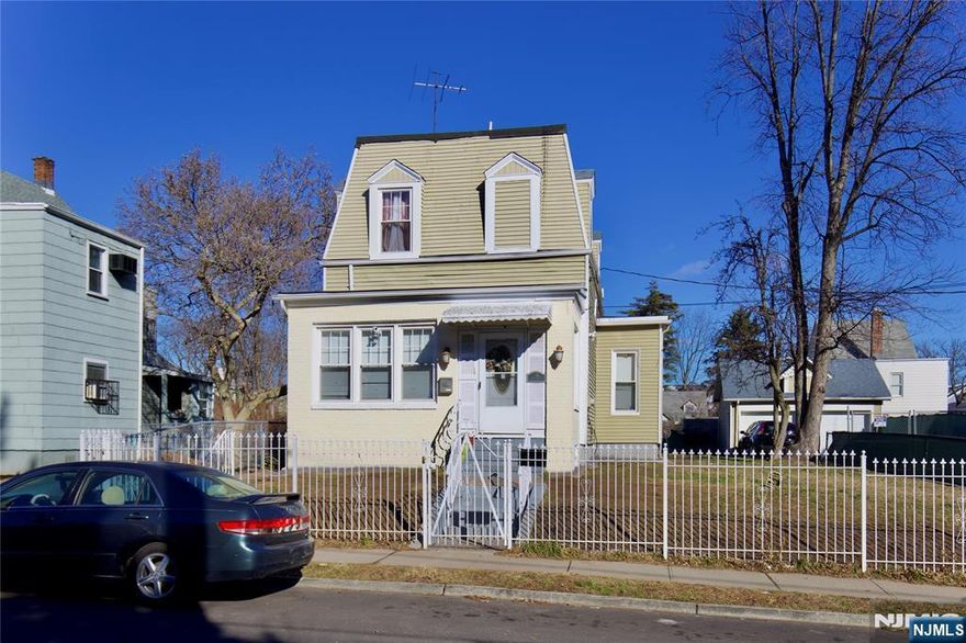 Welcome to this charming 3-bedroom, 2.5-bath Colonial nestled in the heart of Irvington Township. This well-maintained home offers the perfect blend of classic character and modern comfort, featuring a thoughtfully designed layout filled with abundant natural light that creates a warm and inviting atmosphere throughout. The spacious living areas flow effortlessly, ideal for both everyday living and entertaining. A fully finished basement provides flexible additional spaceâ€”perfect for a home office, recreation room, gym, or media area. Outside, the rare double lot offers expanded outdoor potential, while two detached garages provide ample parking and extra storage. Conveniently located just minutes from NYC-bound transportation, major highways, shopping, and schools, this property delivers the best of suburban living with easy access to city conveniences. With generous room sizes, versatile spaces, and a highly desirable location, this home is truly move-in ready. Donâ€™t miss the opportunity to own a home that combines space, functionality, and convenienceâ€”schedule your private showing today! ???