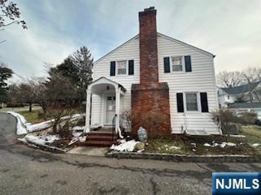 Totally renovated 3-bedroom, 2-bathroom townhouse in the desirable East Hill section of Englewood. Spread across three levels, this home features wood flooring throughout, a modern kitchen with quartz countertops and brand-new stainless steel appliances, and newly renovated bathrooms with updated fixtures and lighting. The living room is enhanced by a cozy gas fireplace. The finished basement includes a bedroom, a full bathroom, and a laundry area, providing flexible living space. The kitchen opens directly to a charming, private garden area exclusive to the townhouse. Freshly painted and move-in ready, this home offers street parking and is just one block from NYC transit, with shopping, dining, and all conveniences nearby. Non-smokers only, no vaping, and no pets. Townhome is being rented completely furnished.