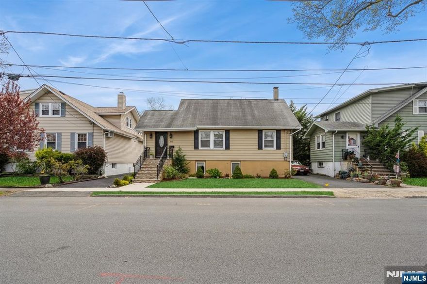 Welcome to this meticulously maintained Cape, nestled on a picturesque, tree-lined street in Ridgefield. Offering a perfect blend of modern comfort and timeless charm, this home is designed for easy living. Step inside to a bright, inviting foyer that flows seamlessly into the open-concept living and dining areas, setting the tone for the entire home. The renovated kitchen boasts sleek cabinetry, stainless steel appliances, granite countertops, and recessed lightingâ€”plus access to both the basement and backyard, ideal for alfresco dining. This level also features intricate wall moldings, a spacious bedroom, and a full bathroom. Upstairs, you'll find two additional bedrooms and a large closet. The finished basement offers extra living space, perfect for extended family. Outside, the detached one-car garage and driveway provide convenient parking. The backyard is an entertainer's paradise, offering a relaxing space for outdoor gatherings.