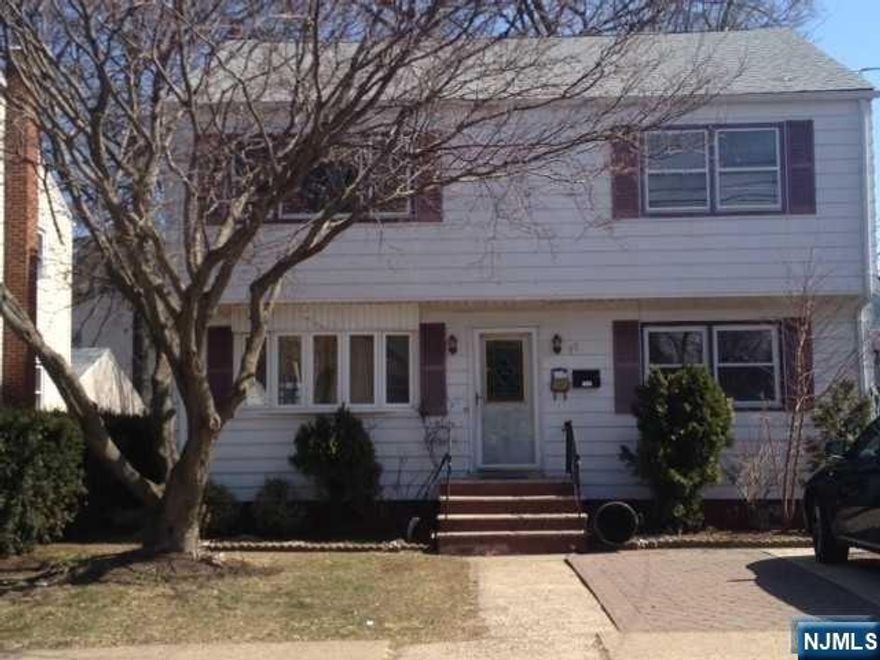 Charming Two-Family Home with Great Rental Potential. This home is a unique opportunity for both investors and homeowners. Each apartment has 2 spacious bedrooms and 2 full bathrooms. The upper-level unit features a bonus attic room, perfect for a home office or a playroom, while the lower unit offers direct backyard access for outdoor enjoyment. A finished basement with a full bathroom adds flexibility. The property includes a 2-car detached garage and dedicated parking spaces for each unit, plus extra driveway space for 3 more vehicles. Both apartments have been consistently rented, making this a solid investment. Move-in ready with potential to maximize rental value through renovations. Located in a safe neighborhood, with excellent schools and public transportation within a short stroll. Ideal for investors or homeowners looking to live in one unit and rent out the other. House is being sold AS-IS.