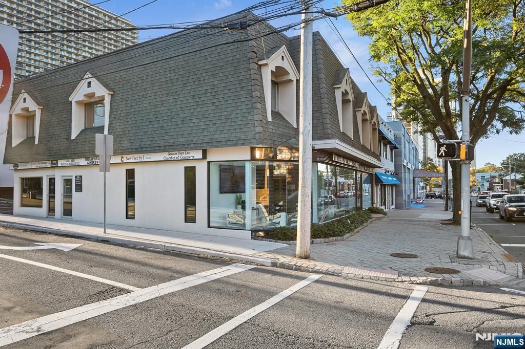 Photo of 210 Whiteman St #103, Fort Lee, NJ 07024 (MLS # 25038008)