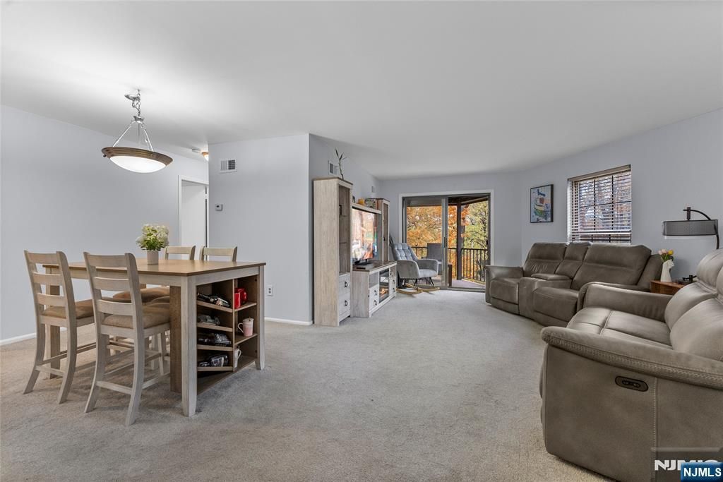 Photo of 181 Long Hill Rd #11-6, Little Falls, NJ 07424 (MLS # 25040066)