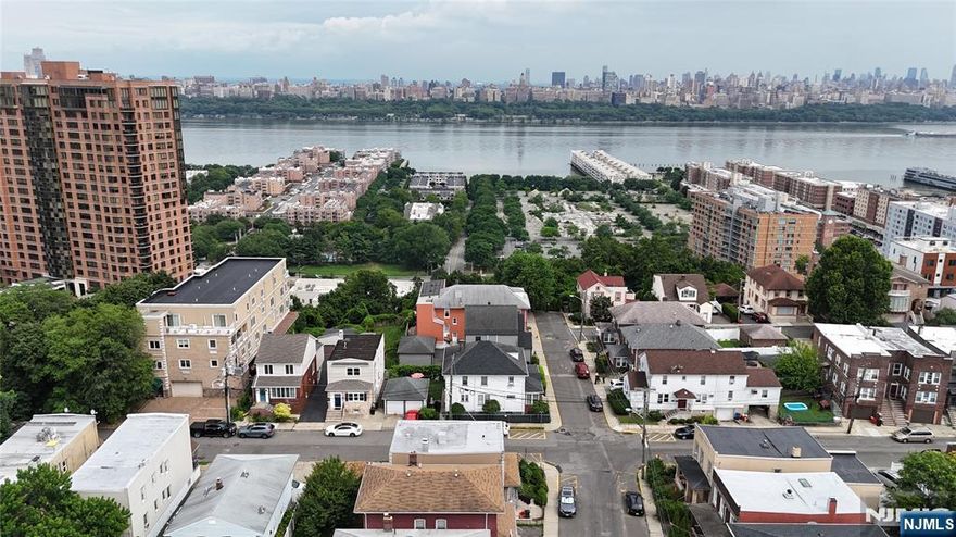 Serenity or a stones throw from NYC? How about both? Welcome to 17 Laird Place in Cliffside Park. This lovely two family home sits on a coveted dead end street, less than four miles to the GWB, seven to the Lincoln Tunnel, and public transportation just one block away. Featuring two 2 bedroom / 1 bathroom units, off street parking, a partially finished basement with walkout to the backyard and a picturesque front porch. Close to shopping, dining, cafes, houses of worship, and the sprawling North Hudson County Park. A dream investment that exemplifies the timeless adage, "location, location, location."