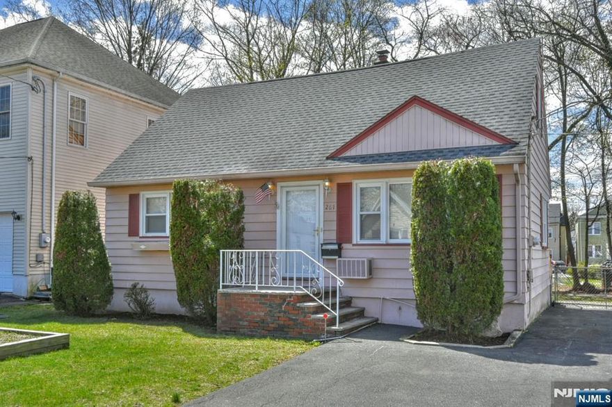 Welcome to this wonderful 4 bedroom, 2 full bath cape in Paterson. Located on a quiet street, this house is sure to please! The first floor features a large living room with hardwood floors, eat-in-kitchen w/ rear door to back yard, 2 bedrooms with hardwood floors, and full bathroom. The staircase to the second floor reveals 2 large bedrooms with closets, full bathroom, and a large home office space or bedroom #5!! The basement features a large finished room with basement door to the outside, and a large mechanical room with laundry hook-ups, workshop, and plenty of storage. The fully fenced in rear yard is very flat and is perfect for outdoor entertaining. Other features of the home include newer hot water heater, newer furnace, and offers central a/c. Perfectly priced, come see this great house today! :)