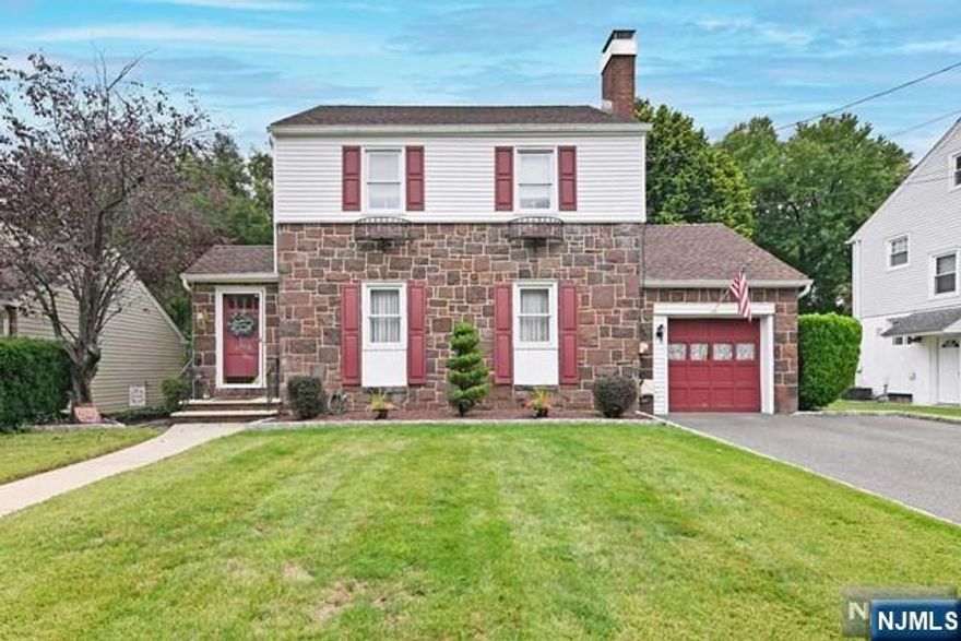 Own your own PicklebalI Court! Immaculate, move in ready, expanded colonial with a stunning 1/4 acre backyard that must be seen to be fully appreciated! Charming throughout, this home includes the following: central AC, fireplace in living rm, hardwood flrs, new roof, central AC, newer fence, gutter leaf protectors, inground lawn sprinklers, eat in kitchen, finished bsmt & more! The dining rm has a beautiful bay window overlooking the spectacular backyard, w/its huge deck ready for years of your BBQs & outdoor gatherings! The yard also has a playground area, a shed, a caged dog run, & the centerpiece is a terrific Basketball Court! Yes you read that right! This is an entertainers dream backyard for enjoyment for all ages! Add the newly finished basement w/large Rec Rm, half bathrm & storage area, & you have a terrific house to call your new home! All this in a great neighborhood in desirable Rochelle Park, close to schools, parks, restaurants, malls, NYC Buses & more. Must See!