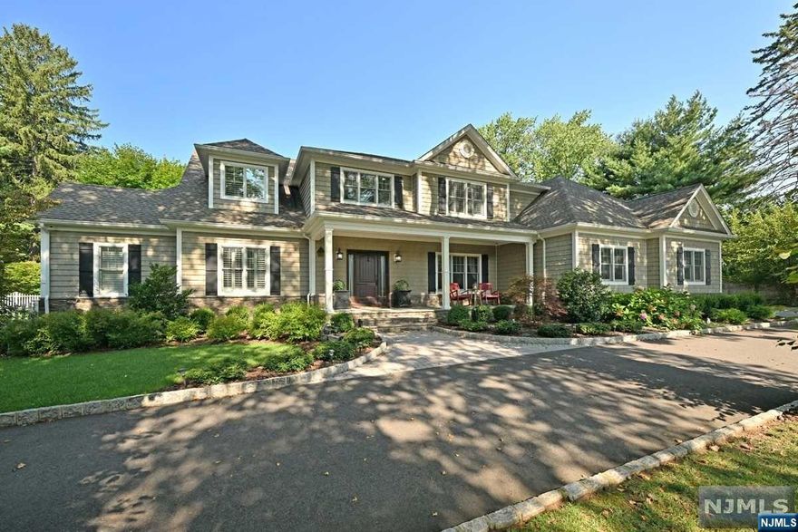 *Wow* Exceptional in every way, you will fall in love with this gorgeous, custom-built, young 5-6 BR, 5.5 Bth Colonial on beautiful .87 acre lot. Impressive builder's own home is loaded w/amenities, character & space. Approx 4,900sf plus huge finished basement! 1st Fl: Grand 2 story EF & staircase, Office/6th BR, MBR w/MBTH, Great Rm w/FPL, vaulted clgs, skylights & sgd to patio, FDR w/tray ceiling & butler pantry, gorgeous MEIK w/granite cntrs & center isle, lge pantry, din area, PR & lndry. 2nd Flr: 4 lge BRs all w/either en-suite bths, or connected to a full bth Beautifully finished bsmnt: Large bar w/granite counters & beer tap dispenser, gym, Fam rm & 5th Bth Fantastic outdoor space w/covered multi-sectioned paver & bluestone patio, hot tub & Regulation Bocci Court. Fenced in yard. Circular driveway w/paver entrances Attn: Car buffs - 5 car total garage spaces with a 3 car att gar & 2 car det gar! 3 zones CAC, 9 zone heat. Each BR has separate zone And so much more