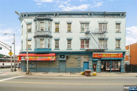 Photo of 19 Park Avenue, Paterson, NJ 07501 (MLS # 25018768)