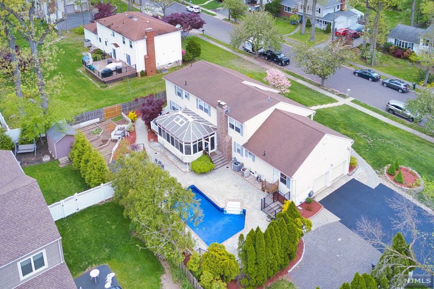 Pride of Ownership! The whole house was gutted out in 2017. Wonderful high end style Custom home located in desirable Tom's Lake Section within 20 miles from NYC with 4 BR, 4.5 Baths, full finished basement, and in-ground swimming pool. 1st floor offers welcoming two story entry foyer with filled with natural light, formal living room, formal dining room w/built in cabinet and coffee bar, entertaining family room w/ fire place sliding door to conservatory room leads to beautiful swimming pool! New modern kitchen is chef's delight- oversized "Waterfall " style center island w/ deep sink, "push to open cabinetry with pull out drawers, and S/S appliances. Also laundry room w/ door to swimming pool, and master bedroom w/ master bathroom w/stall shower and soaking tub. 2nd floor offers 2nd BR w/own full bathroom, two more BR, and main bathroom. Beautifully finished huge basement w/dry sauna, multi purpose rooms, summer kitchen. Top rated school!