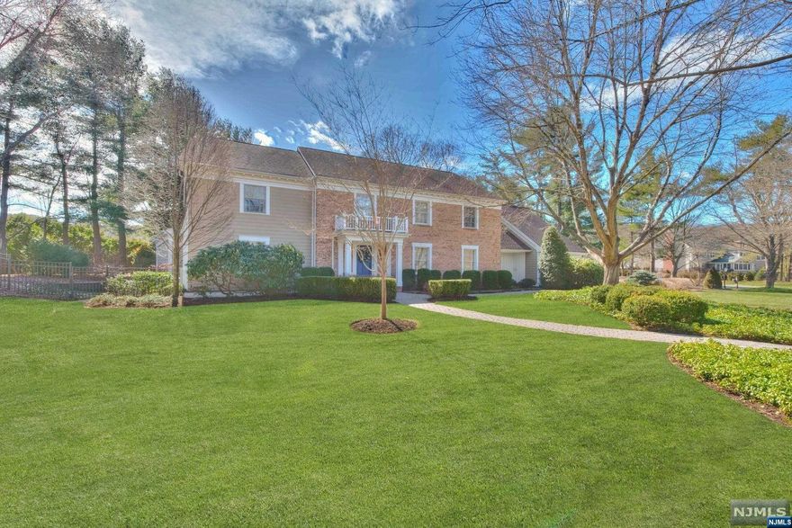 MAJESTIC 5BEDROOM CUSTOM BUILT CENTER HALL COLONIAL PROVIDES PLENTY OF SPACE FOR FAMILY AND GUESTS.A BREATHTAKING OUTDOOR OASIS ON FLAT ACRE OF GORGEOUSNESS WHERE FLOWERING TREES AND PERENNIALS ABOUND.THE OUTDOORS IS COMPRISED OF LAVISH LANDSCAPED GROUNDS, GUNITE POOL & PATIO.TWO STORY ENTRY FOYER SETS THE TONE FOR THE REST OF THE HOUSE AND LEADS TO THE FAMILY ROOM ,COMPLETE WITH BUILT-IN WET BAR AND FIREPLACE PROVIDING A COZY SPACE FOR RELAXATION AND ENTERTAINMENT.CUSTOM BUILT MEDIA RM WITH FRENCH DOORS.FORMAL DR OPENS TO A LARGE KITCHEN WITH SEPARATE BREAKFAST AREA.THE INTERIOR OF THE HOUSE HAS BEEN UPDATED WITH PREMIUM FINISHES, CUSTOM MILLWORK MAKING IT BOTH ELEGANT AND FUNCTIONAL.2ND FLOOR BALCONY LEADS TO PRIMARY BEDROOM WITH LUXURIOUS BATHROOM AND CUSTOM CLOSETS.BEAUTIFUL FRONT TO BACK GUEST SUITE. RADIANT HEATING, HARDIE PLANK EXTERIOR.OVERALL,THIS IS A BEAUTIFUL HOME THAT COMBINES CLASSIC DESIGN WITH MODERN AMENITIES TO PROVIDE A COMFORTABLE & STYLISH LIVING EXPERIENCE.