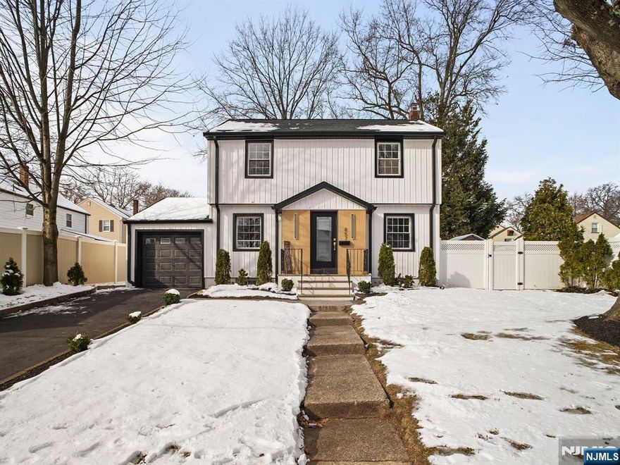 Welcome to this stunning 4-bedroom, 2-bath home in Maywood, offering a bright open-concept layout and designer finishes throughout. The main living area is filled with natural light and features coffered ceilings, recessed lighting, custom millwork, and elegant herringbone hardwood floors. The modern kitchen flows seamlessly into the dining area and showcases sleek cabinetry, quartz countertops, stainless steel appliances, and an island with seating, ideal for entertaining. A statement chandelier adds a sophisticated touch. The home also features a full finished basement, providing flexible space for a recreation room, home office, gym, or guest area. Step outside to enjoy a spacious deck overlooking a private backyard, perfect for outdoor dining, relaxing, and entertaining. Ideally located within walking distance to Bergen Town Center, near parks, shopping, and dining, with an easy commute to NYC. Move-in ready, beautifully designed, and perfectly located, this home is a must-see!!