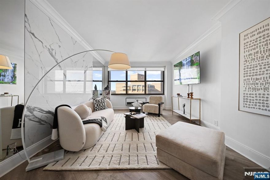 Experience luxury living in this expansive 2,100 sq. ft. penthouse at Galaxy Towers in Guttenberg, NJ, where every detail is designed to impress. This rare 3-bedroom, 3.5-bath residence boasts sweeping Hudson River and George Washington Bridge views from every room, creating a dramatic backdrop for daily life. The open-concept layout is ideal for entertaining, highlighted by a beautifully renovated kitchen with an oversized 8 ft x 4.5 ft island, perfect for gatherings. Elegant crown molding enhances the refined aesthetic, while the primary suite offers custom closets for abundant storage. A rare in-unit washer and dryer, exclusive to penthouse residences, adds unmatched convenience. Two oversized private terraces extend the living space outdoors, offering panoramic skyline and waterfront vistas for relaxation or entertaining. Galaxy Towers elevates the lifestyle with resort-style amenities including indoor and outdoor pools, state-of-the-art fitness centers, full-service spa, tennis and pickleball courts, game room, childrenâ€™s playroom, and a residents lounge with sweeping NYC views. A tranquil garden and on-site mall provide daily convenience, while 24-hour concierge and security ensure peace of mind. With all-inclusive utilities (excluding cable), available parking, and effortless access to Manhattan by bus or ferry, this penthouse delivers the ultimate combination of sophistication, comfort, and accessibility in one of New Jerseyâ€™s most iconic residential communities.